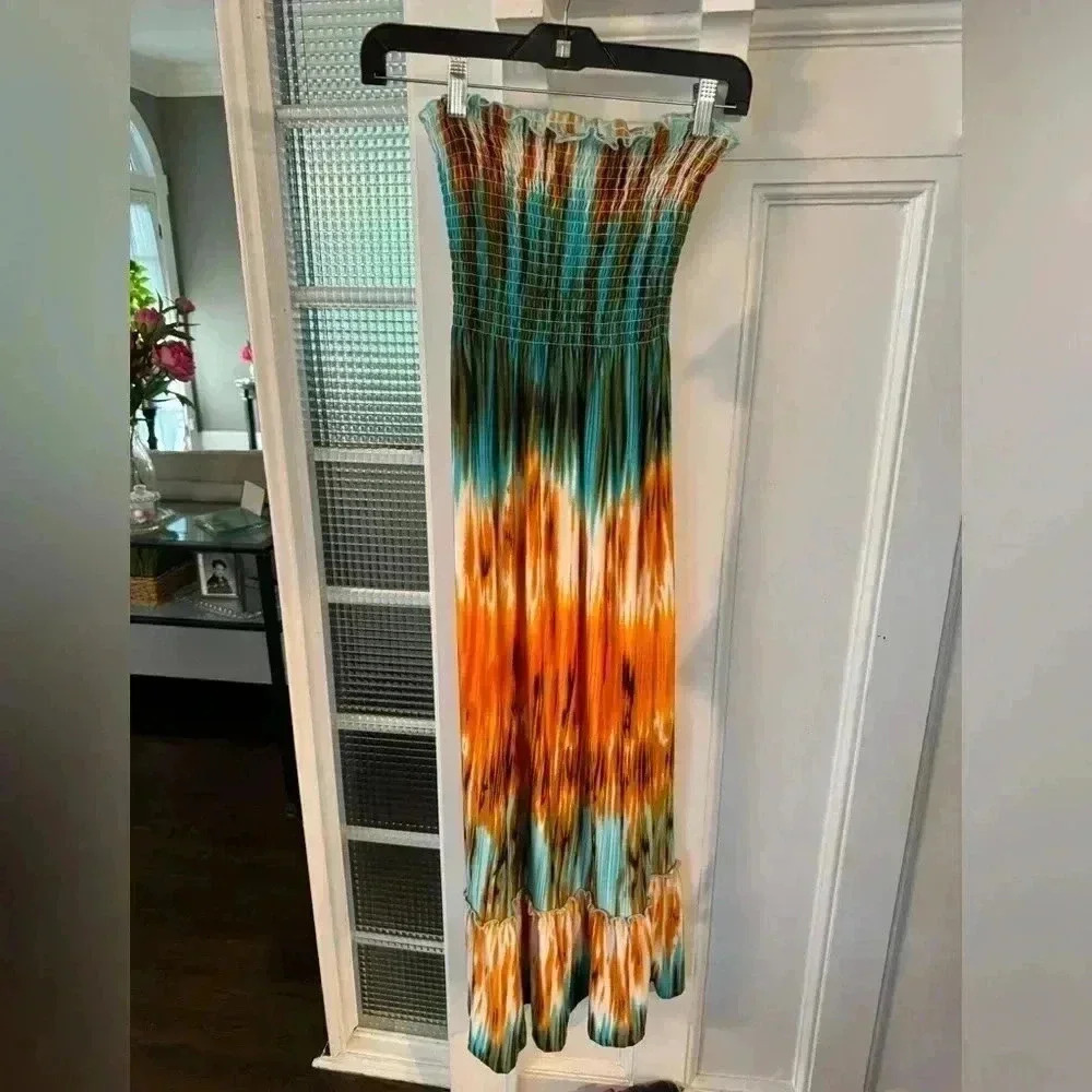 Steven Madden strapless full length dress. Tie dye, stretch top and ruffle hem.